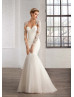 Mermaid Ivory Tulle Beaded Long Sleeves Sheer Back Wedding Dress